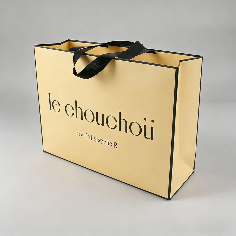 Custom ribbon-handle paper bag